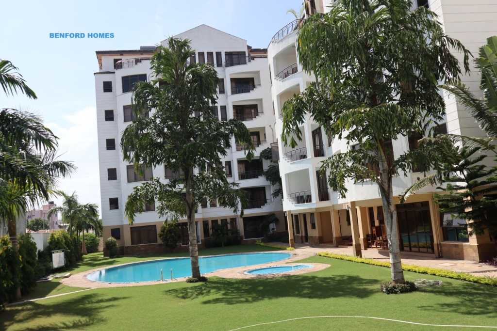 Well attended lawn with trees lined to a swimming pool edging to 3 bedroom fully furnished apartments| Benford Homes