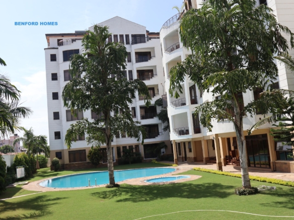 Well attended lawn with trees lined to a swimming pool edging to 3 bedroom fully furnished apartments| Benford Homes