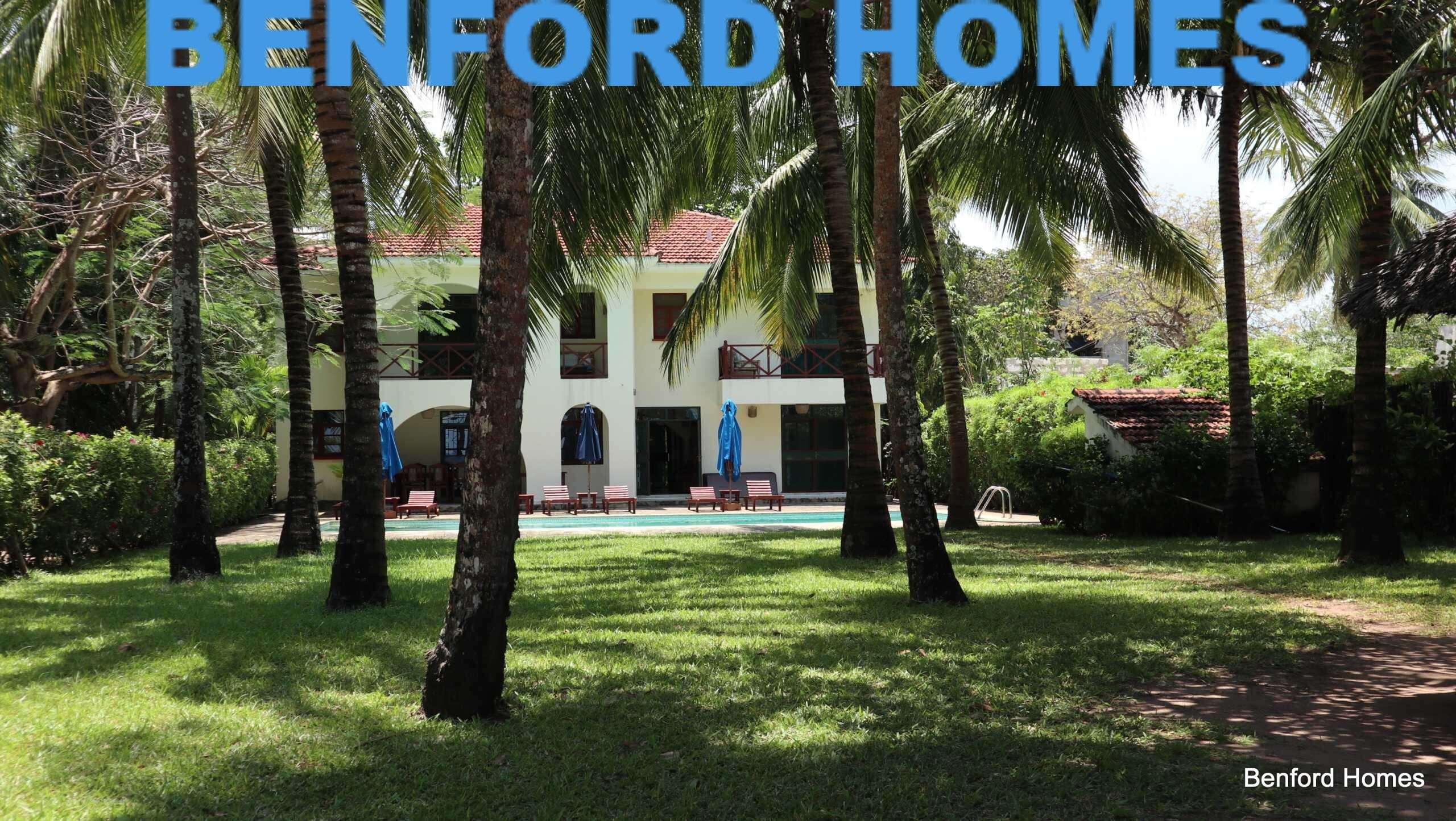 Garden and tree lined villa with beach breeze and view| Benford Homes