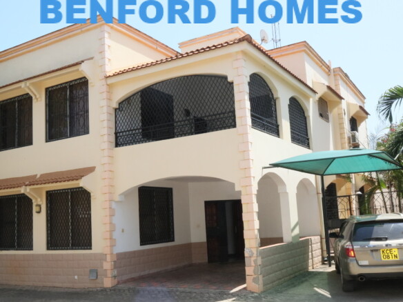 4 bedroom mansion in a shared compound in Nyali with Toyota 4X4 car parked in the shade | Benford Homes Apartments for sale